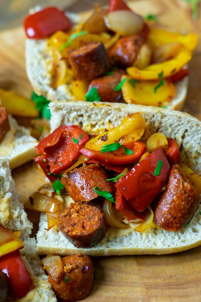 Top view of Sausage and Peppers served as sandwich.