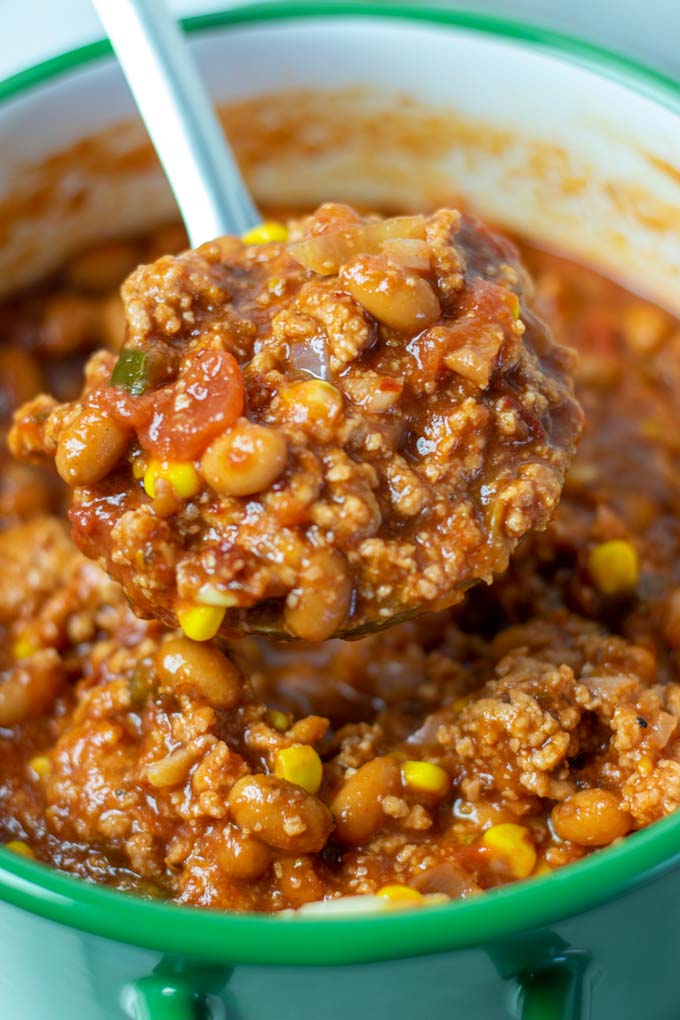 Closeup of a large serving spoon of the Taco Soup.