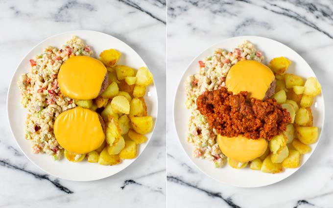 Cheeseburgers and hot sauce are given on top of the Garbage Plate.