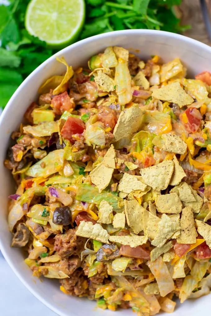 Top view on a large serving bowl with the Taco Salad.