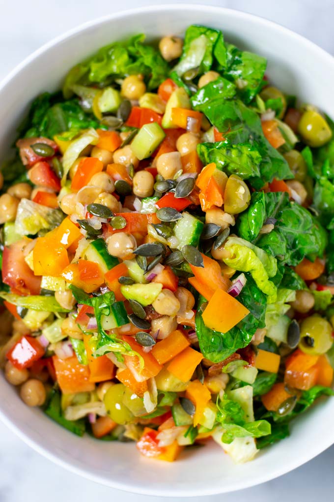 Closeup from above on the ready mixed Chopped Salad in a bowl.