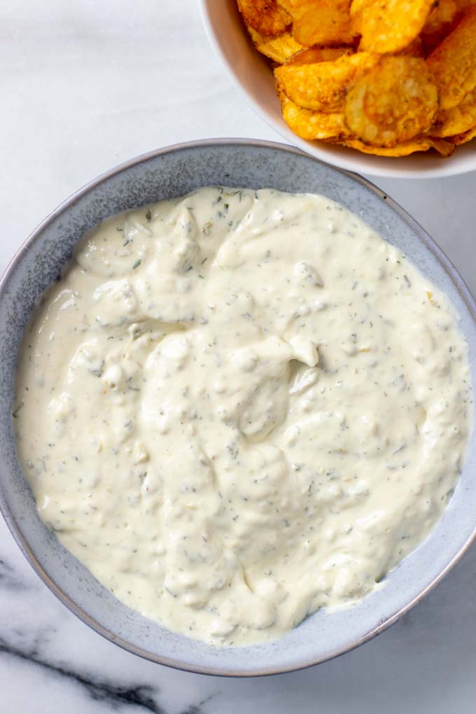 Top view on a bowl with creamy Jalapeño sauce.