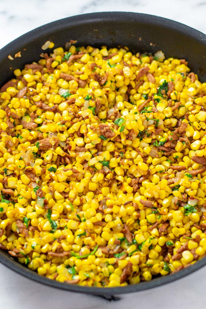 Closeup on a pan with the served Fried Corn.