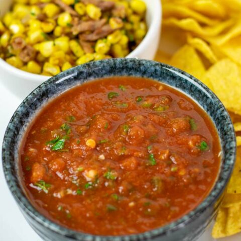 Closeup on a serving bowl with the Restaurant Style Salsa.