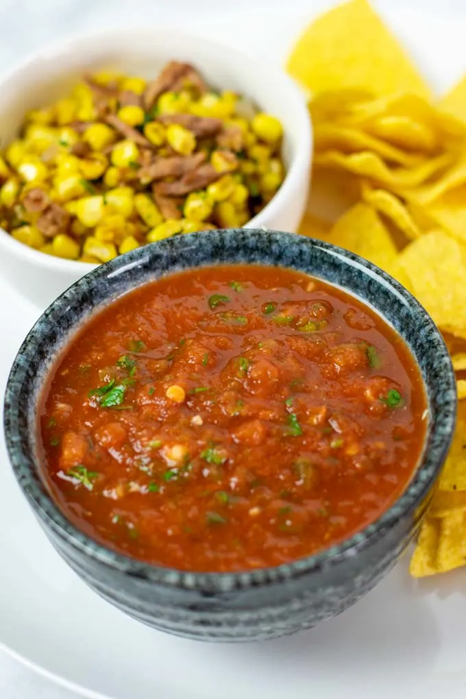 Closeup on a serving bowl with the Restaurant Style Salsa.