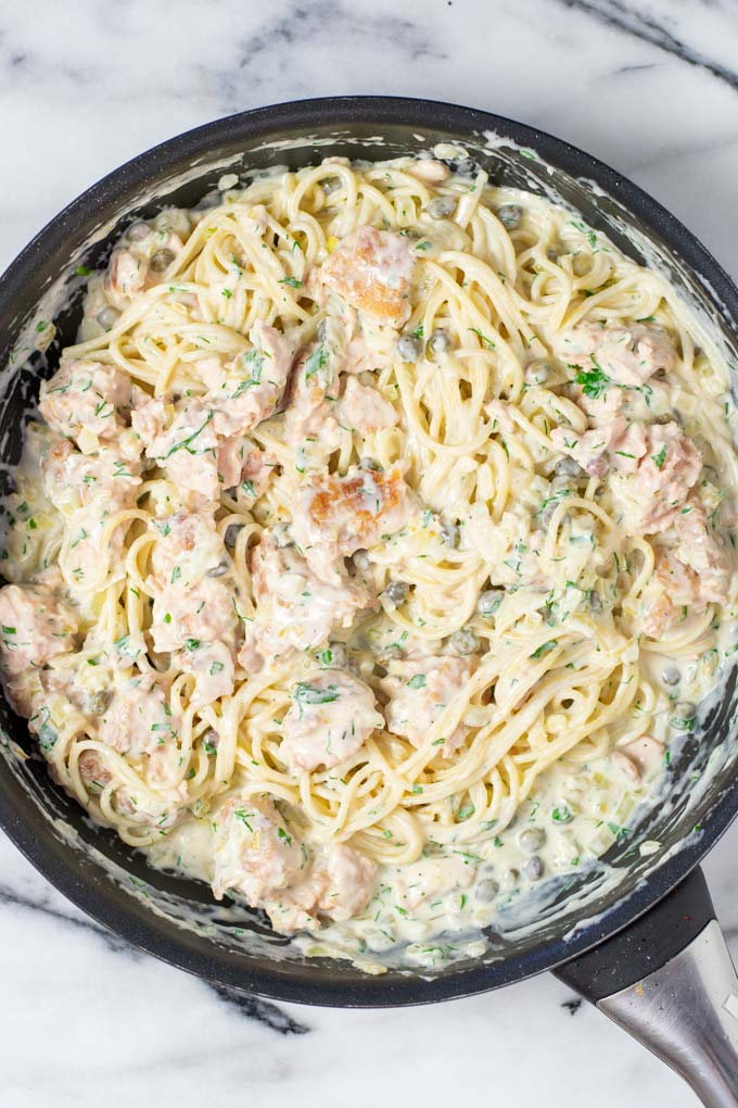 top view of the saucepan with the mixed Salmon Pasta.