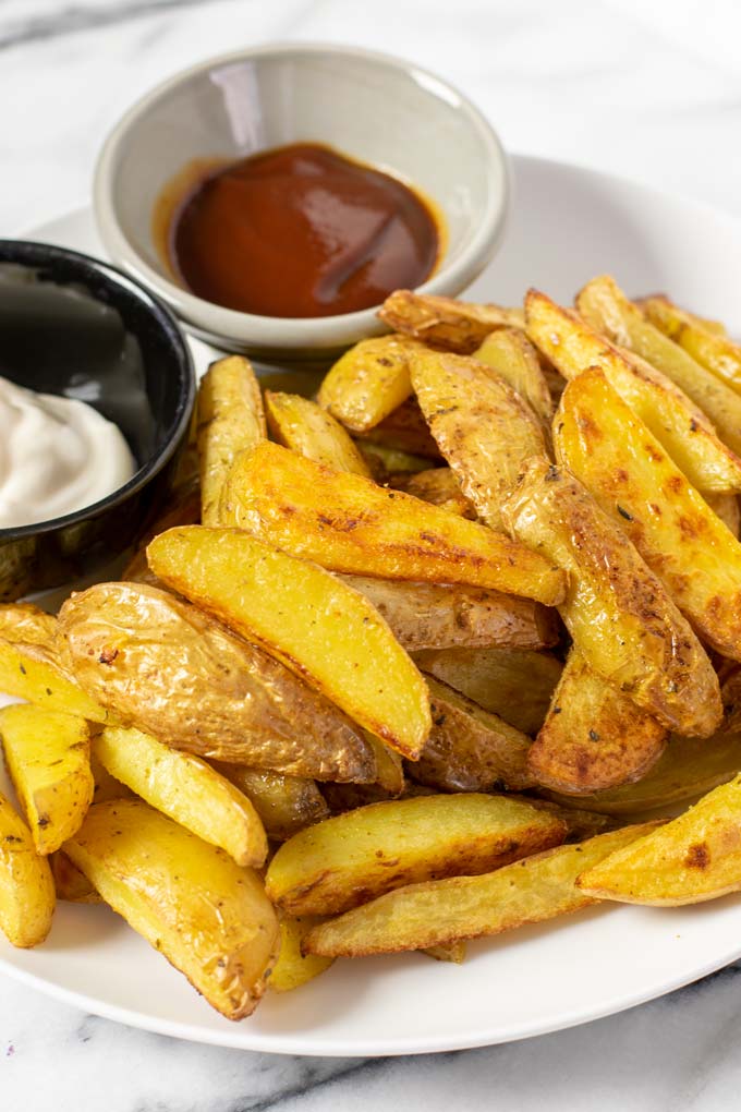 Closeup of the Steak Fries served on a white plate.