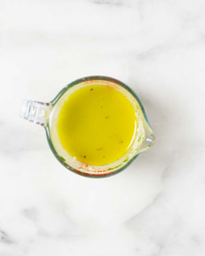 Dressing for the Nicoise Salad in a glass jar.