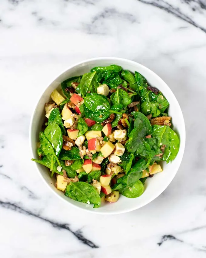 Top view on a serving bowl with the Spinach Salad