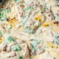 The Creamy Tuscan Chicken is ready in a pan.