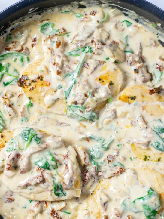 The Creamy Tuscan Chicken is ready in a pan.