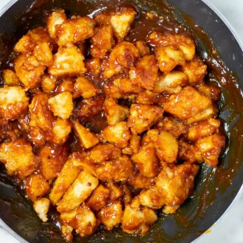 Top view on a pan with the ready Sweet and Sour Chicken.