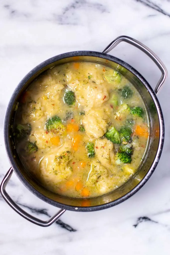 Top view of Dumpling Soup in a pot.