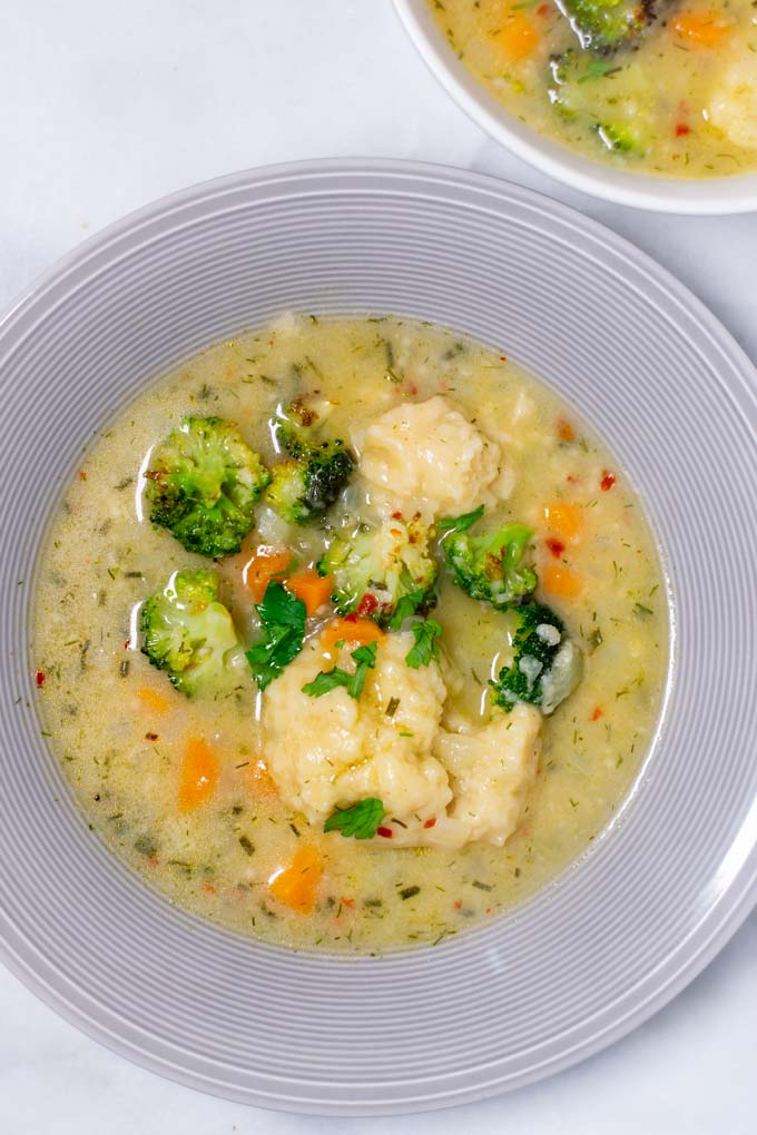 Top view of a plate with the Dumpling Soup.