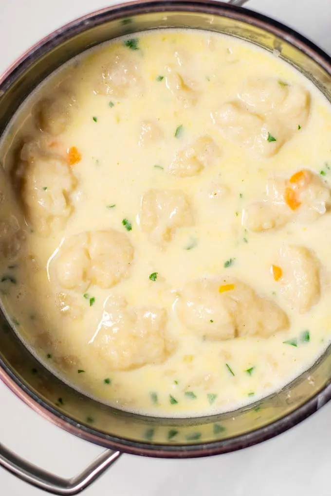 Closeup on the Chicken and Dumplings in the pot.