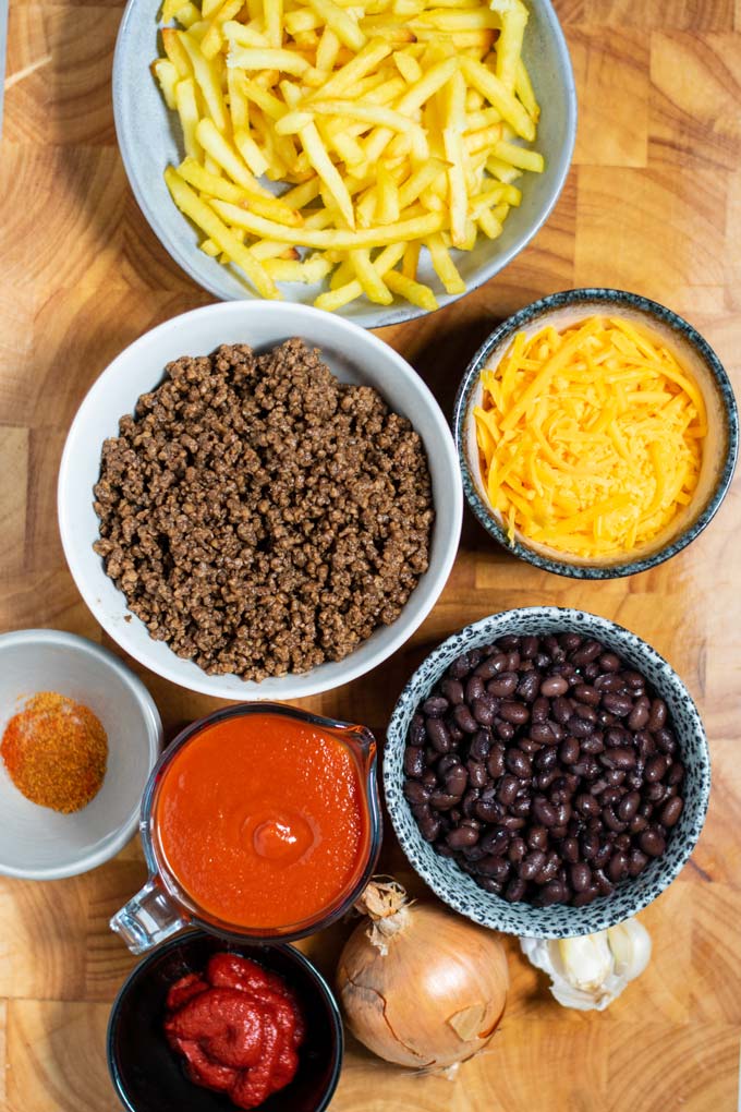 Ingredients needed for making Chili Cheese Fries are collected before preparation.