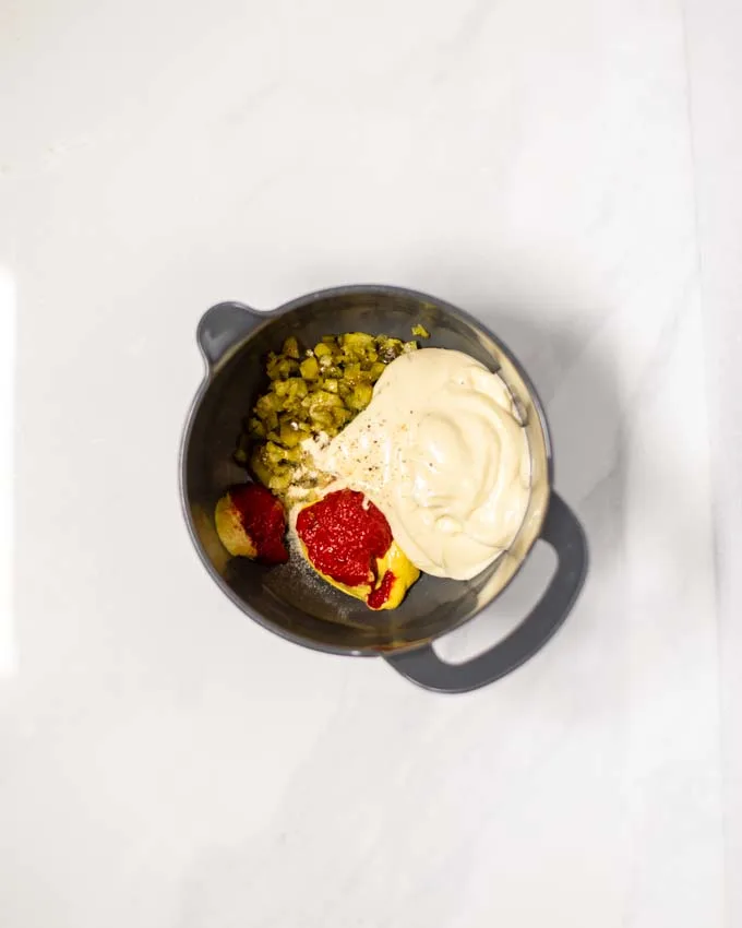 Top view of a mixing bowl with all ingredients before mixing.