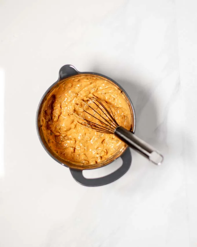 Top view of a mixing bowl with all ingredients of the Hot Dog Sauce after mixing.