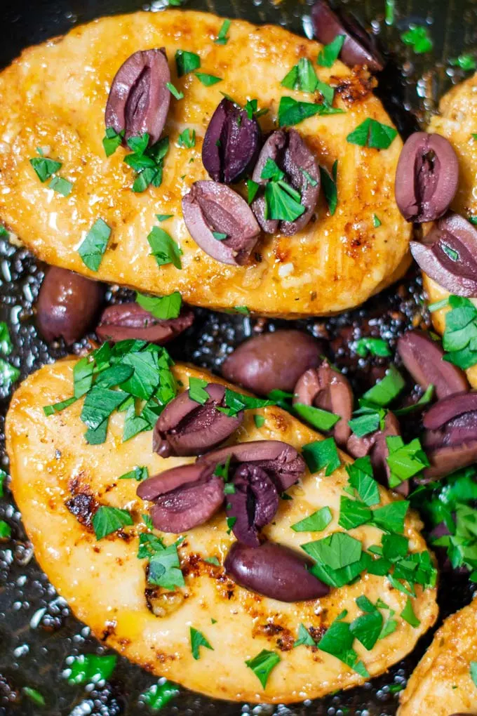 Closeup on the Greek Chicken in a pan.