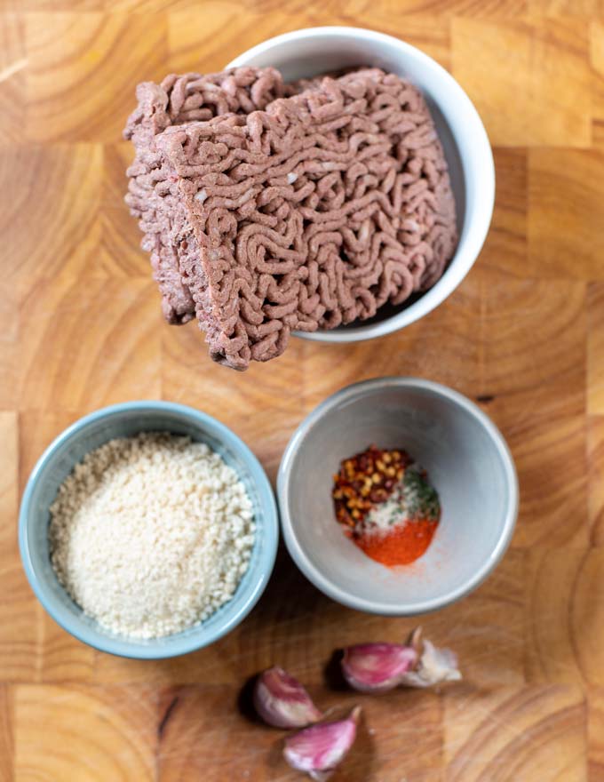 Ingredients for the Sausage Patties are collected on a board.