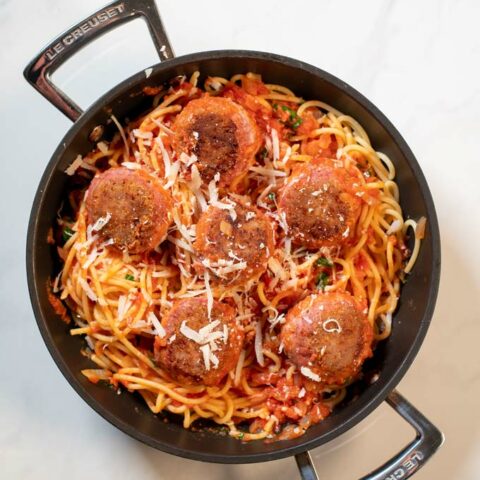 Top view of a pan with Spaghetti and Meatballs.