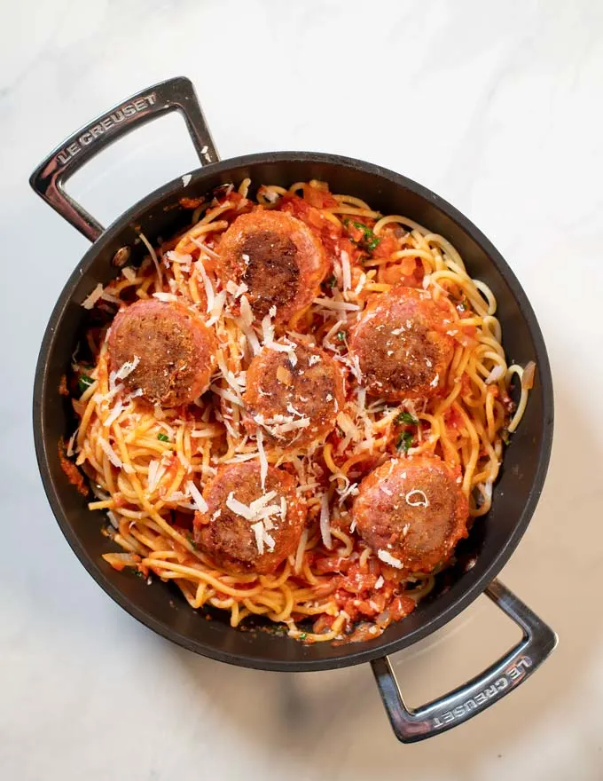 Top view of a pan with Spaghetti and Meatballs.