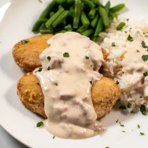 Smothered Chicken on a plate.