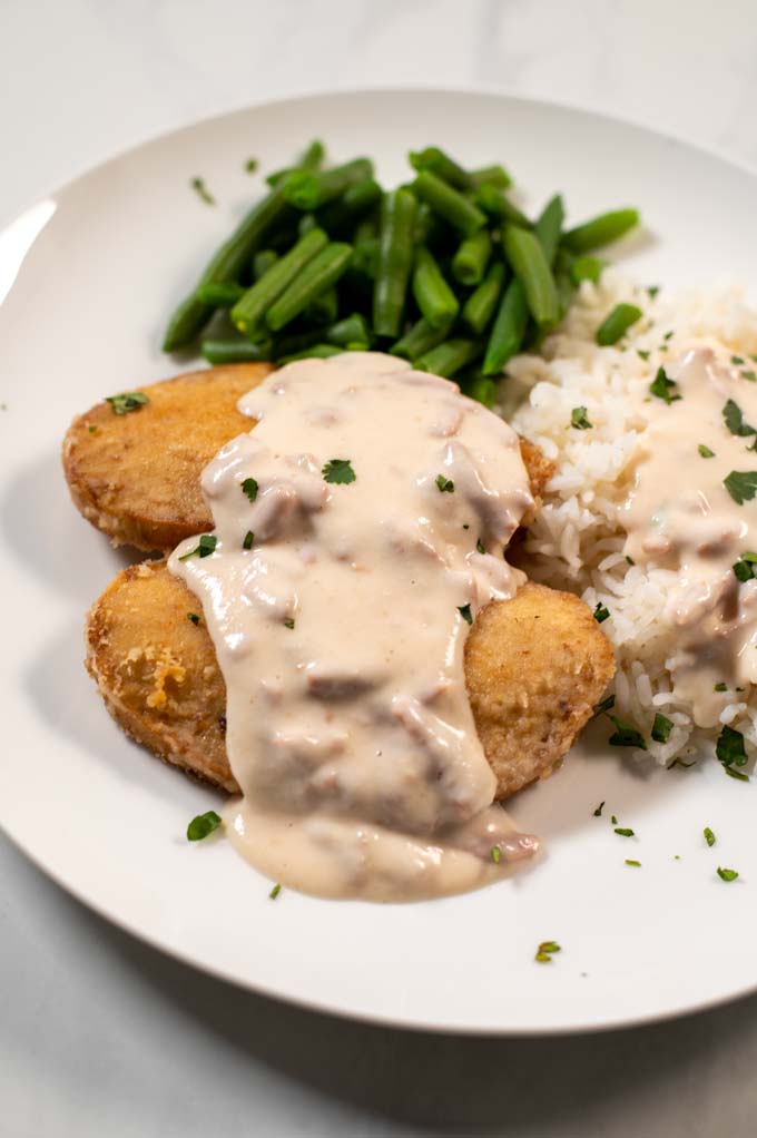 Smothered Chicken on a plate.