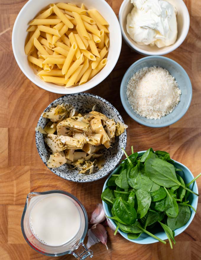 Ingredients needed to make Artichoke Pasta are collected before preparation.