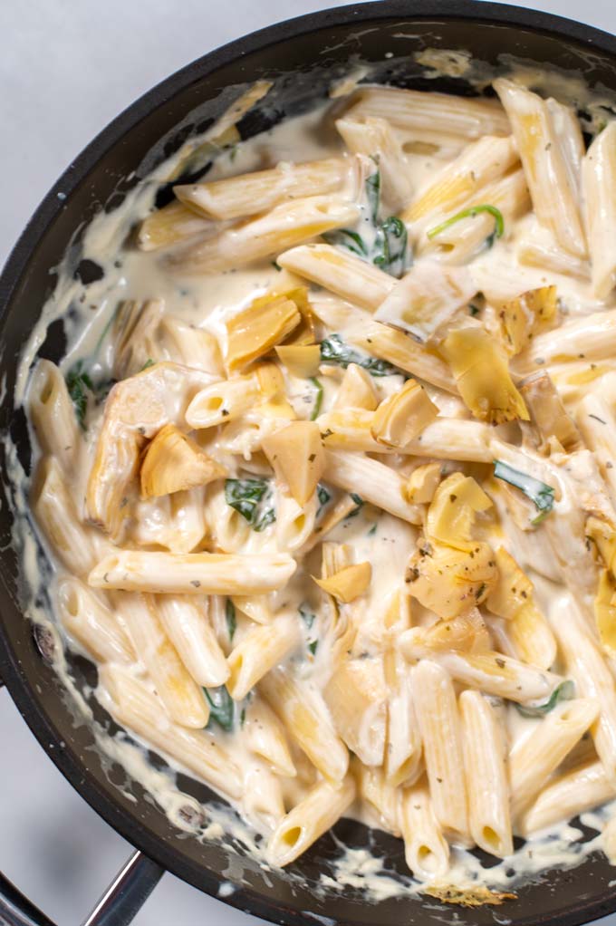 Closeup of ready Artichoke Pasta in a pan.