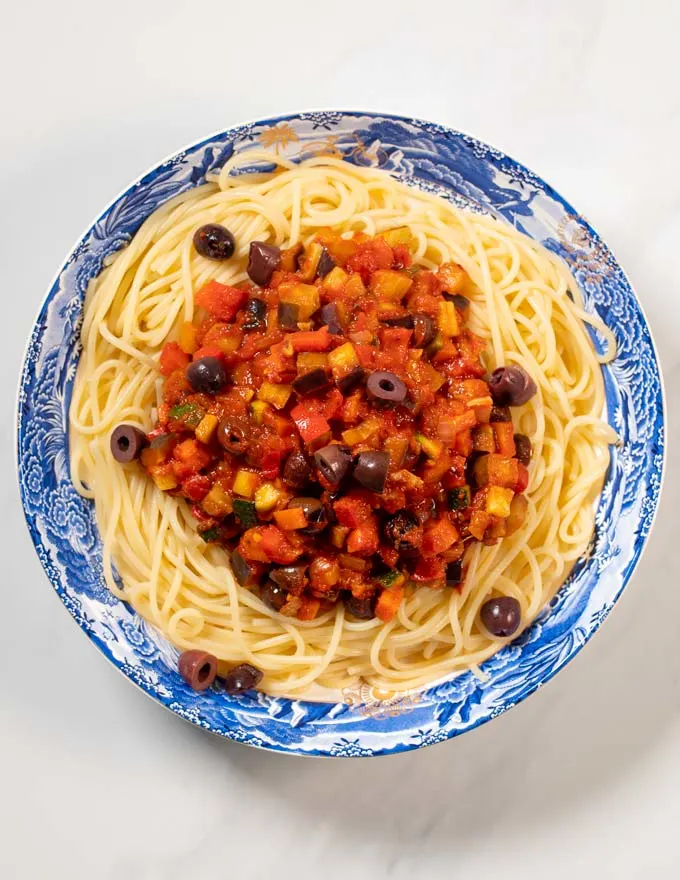 A large portion of Vegetable Spaghetti is served on a plate.
