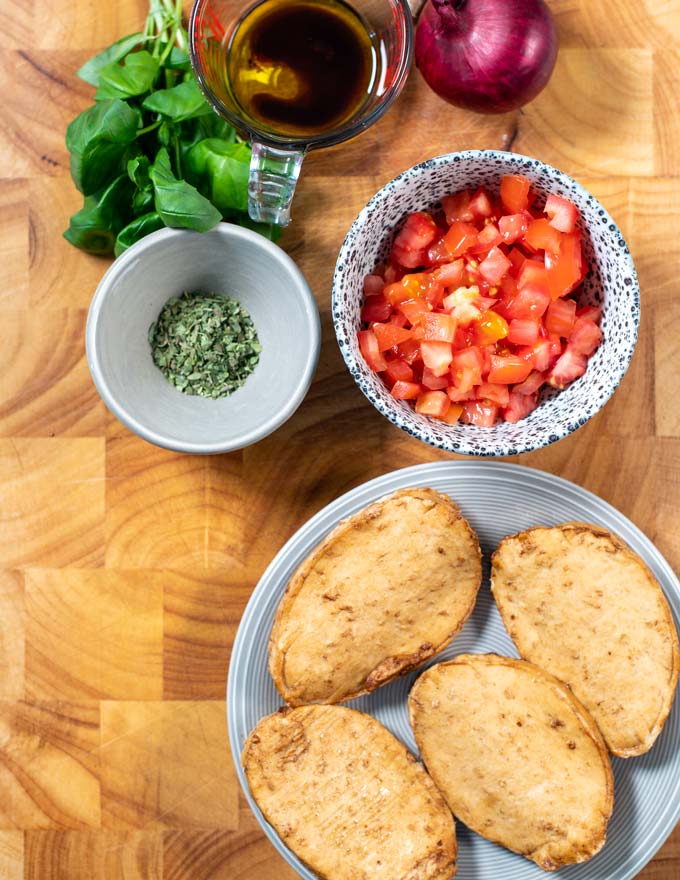 Ingredients needed to make Bruschetta Chicken collected before preparation.