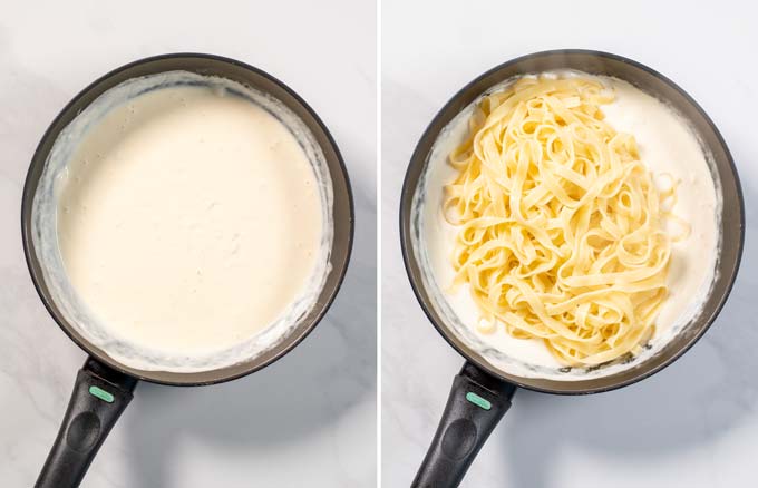 Alfredo sauce in a pan is mixed with cooked pasta.