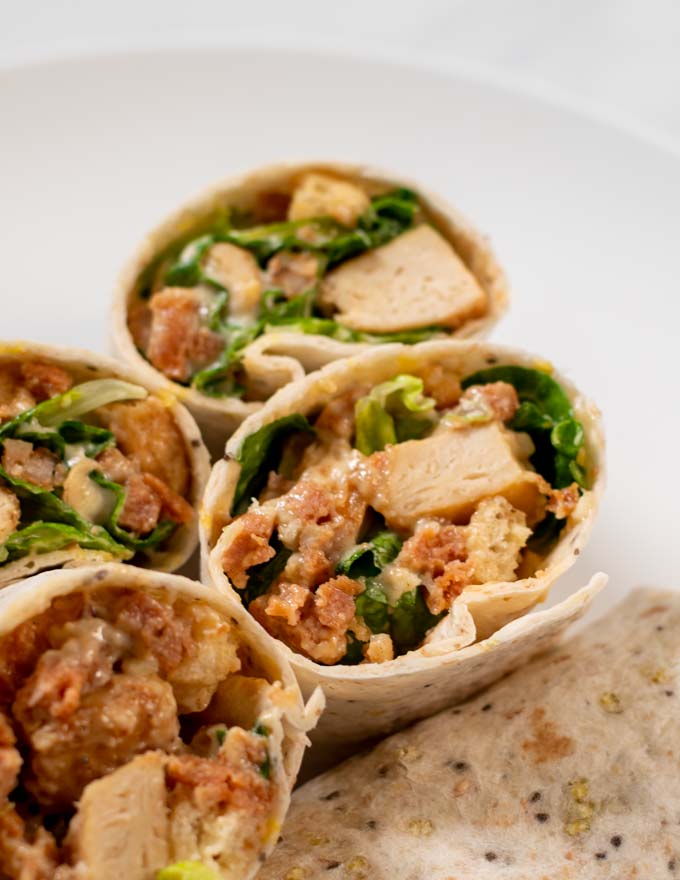 Stacks of Chicken Caesar Wraps.