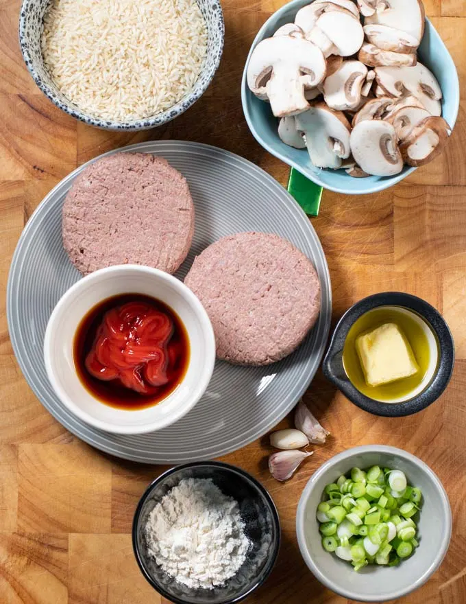 Ingredients needed to make Loco Moco are collected on a board.