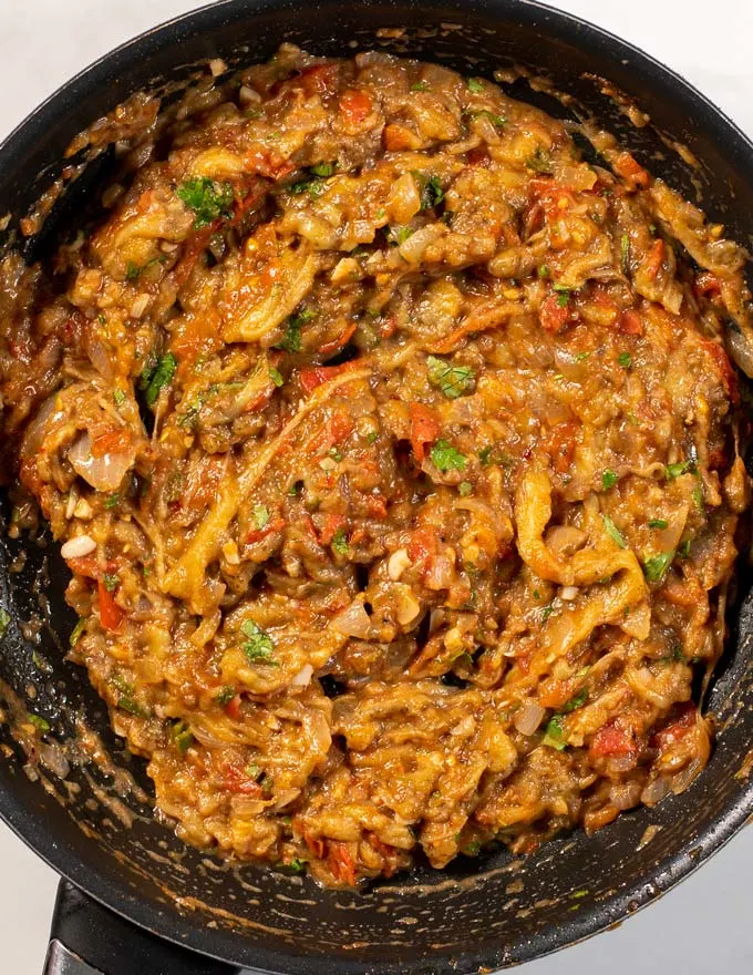 Baingan Bharta in a frying pan.