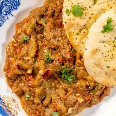 A serving of Baingan Bharta with Naan.