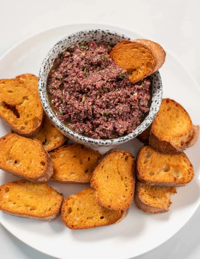 Closeup of a party serving of Olive Tapenade.