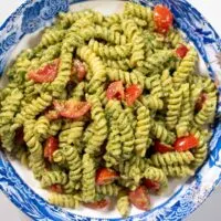 Closeup on a large serving of Pesto Salad.