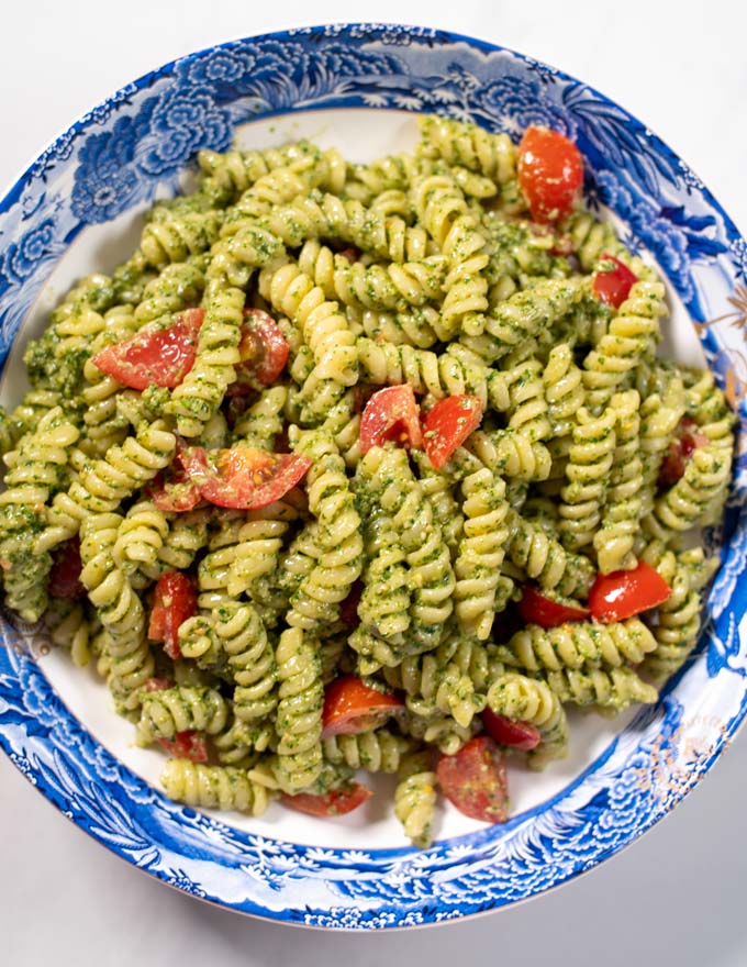 Closeup on a large serving of Pesto Salad.