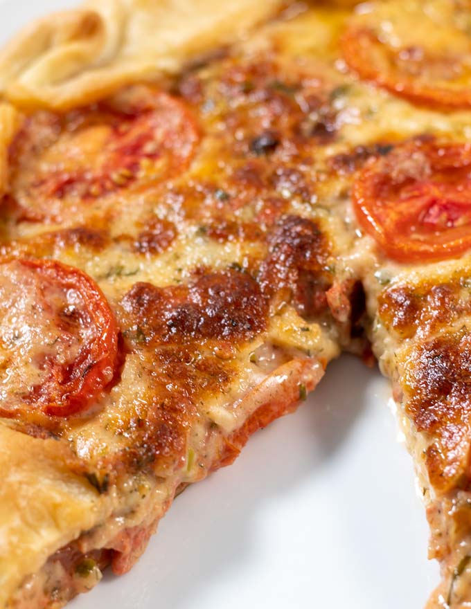 Closeup of the filling of the baked Tomato Pie.