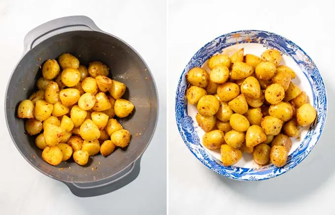 Fried potatoes are mixed with seasonings in a mixing bowl, then transferred onto a serving plate.