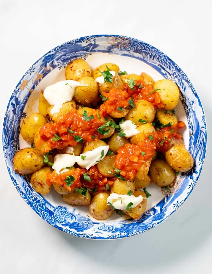 Top view of a serving of Patatas Bravas.