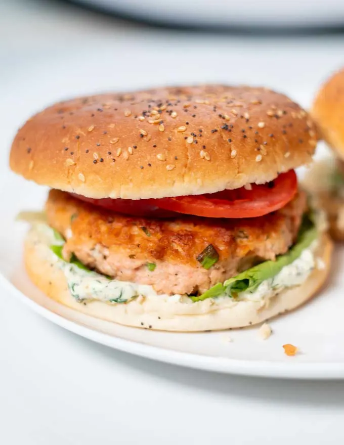 A Salmon Burger on a plate.