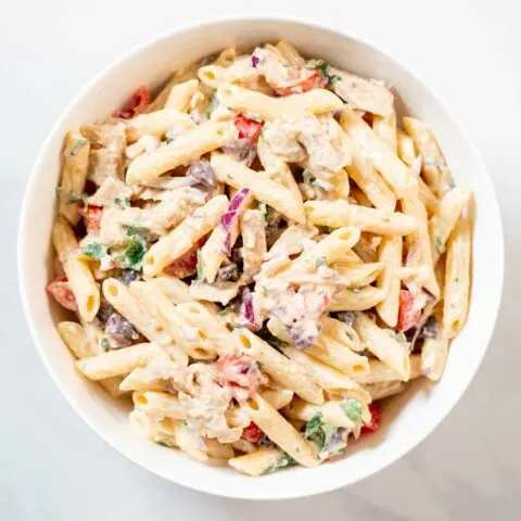 Chicken Pasta Salad is mixed in a large bowl.
