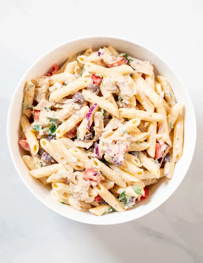 Chicken Pasta Salad is mixed in a large bowl.