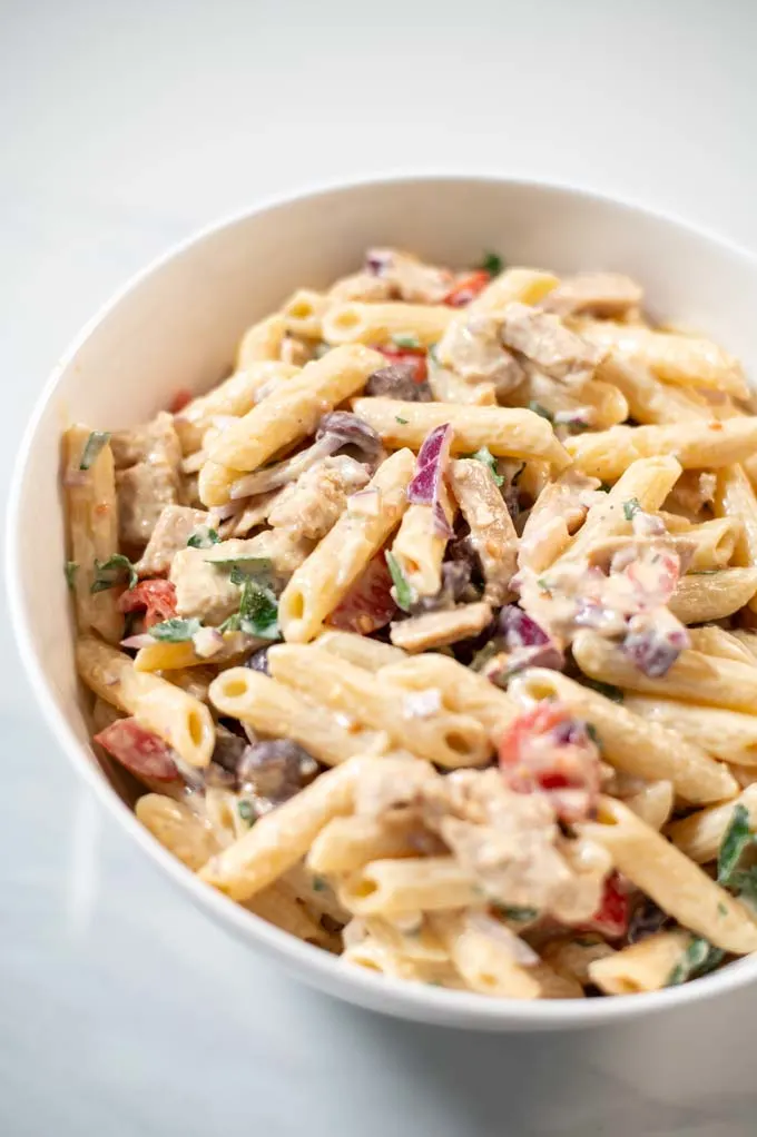 Closeup of a bowl with Chicken Pasta Salad.