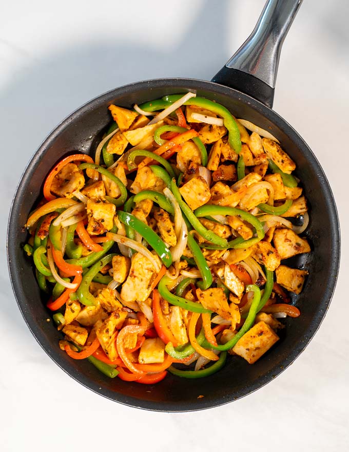 Top view of Chicken Fajitas in a pan.