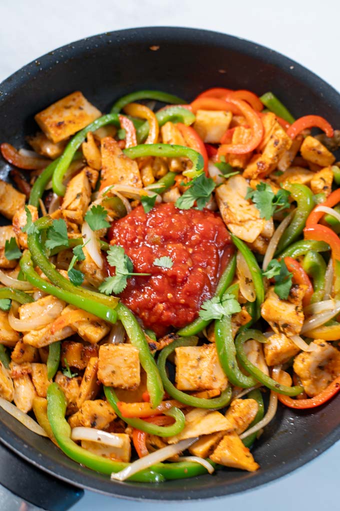 Closeup of Chicken Fajitas with salsa.