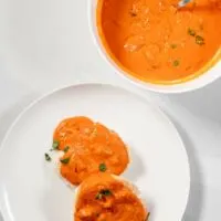 Top view on a portion of biscuits served with Tomato Gravy.